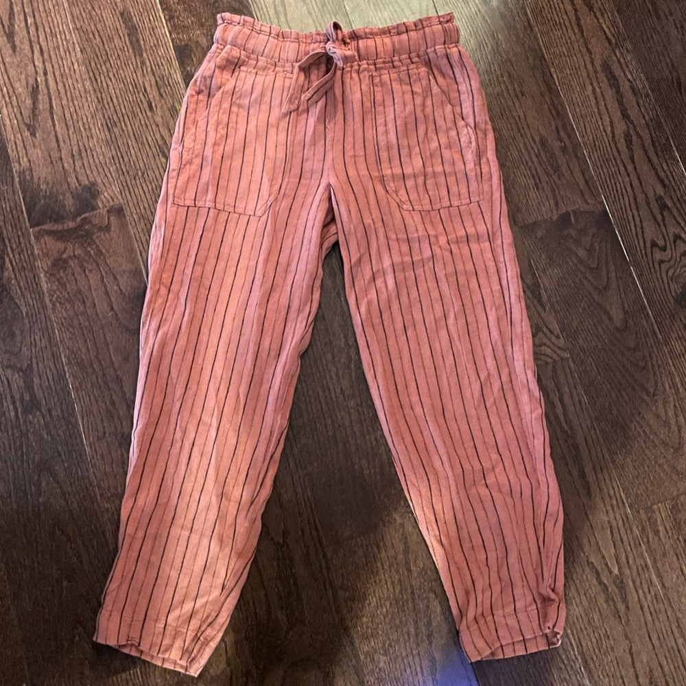 Flowy orange and black pants.